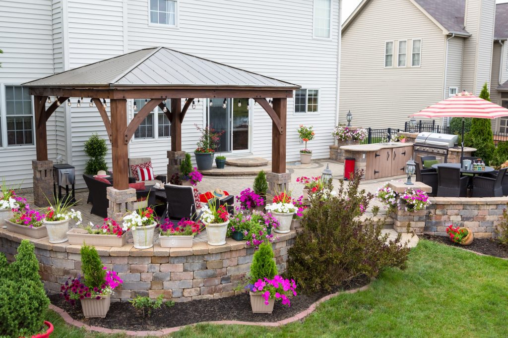 Colorful exterior curved patio with summer flowers